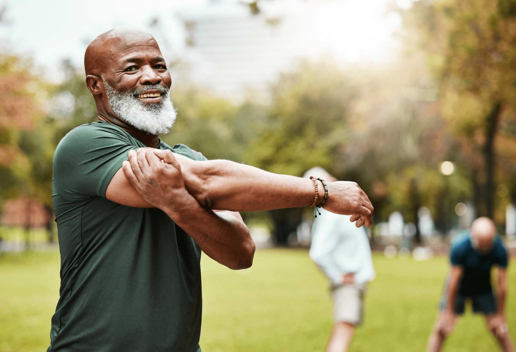 man exercising and stretching his arms